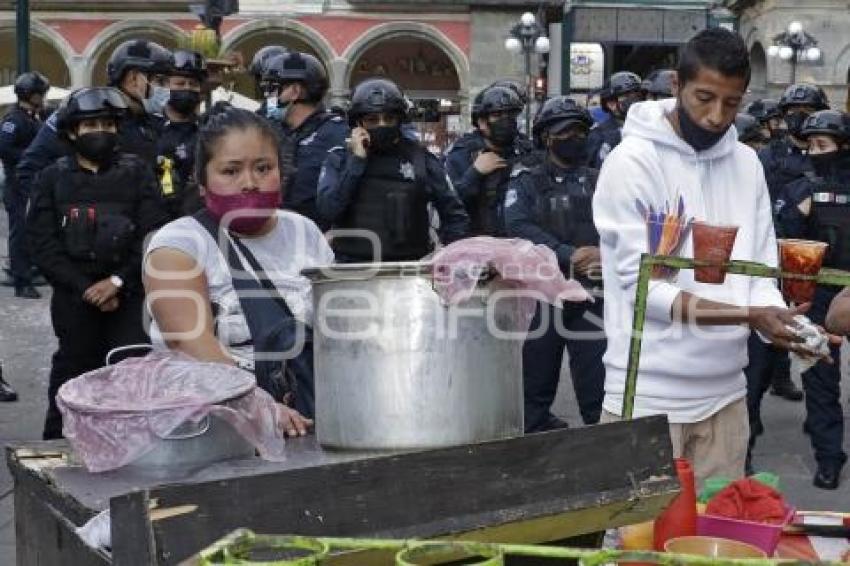 POLICÍA . RIÑA DE AMBULANTES