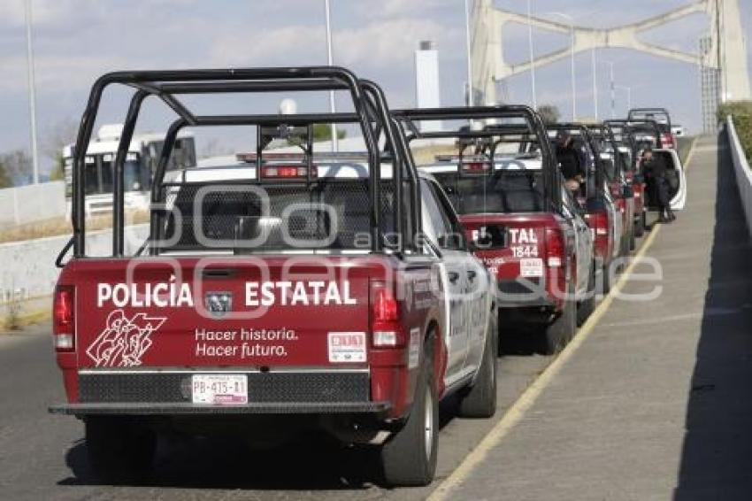 CHOLULA . BLOQUEO DE TRANSPORTISTAS