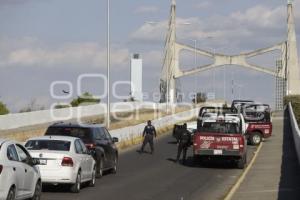 CHOLULA . BLOQUEO DE TRANSPORTISTAS