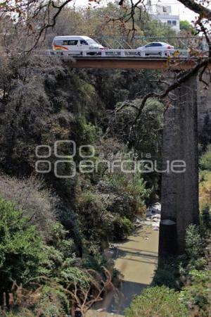 NOTA ROJA . RESCATE EN PUENTE