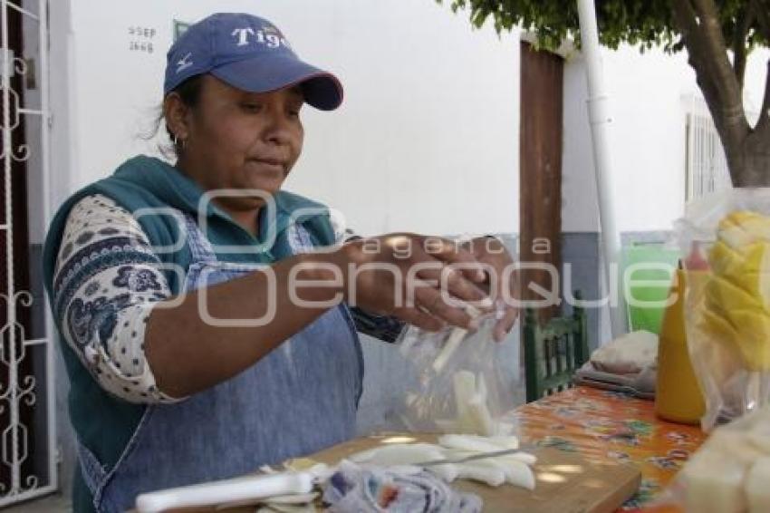 DÍA DE LA MUJER . COMERCIANTE