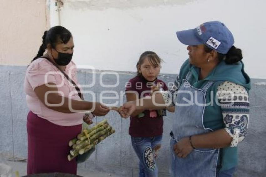 DÍA DE LA MUJER . COMERCIANTE