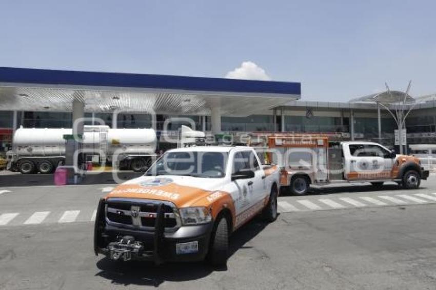 GASOLINERA . DERRAME DE COMBUSTIBLE