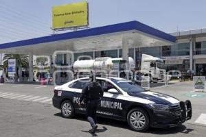 GASOLINERA . DERRAME DE COMBUSTIBLE