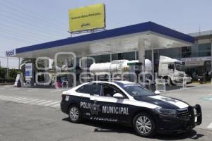 GASOLINERA . DERRAME DE COMBUSTIBLE