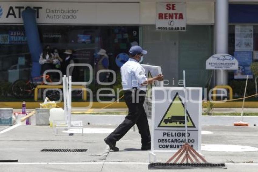 GASOLINERA . DERRAME DE COMBUSTIBLE