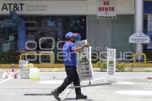 GASOLINERA . DERRAME DE COMBUSTIBLE