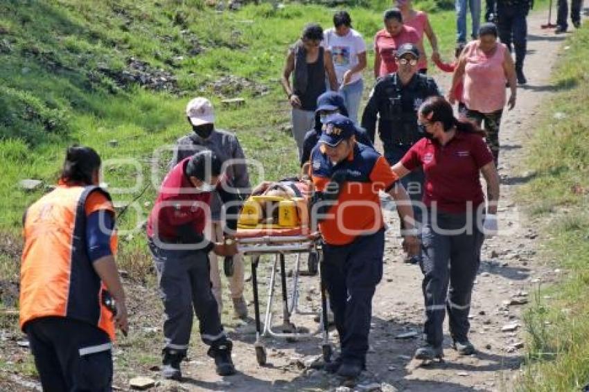 SEGURIDAD . MUJER BARRANCA