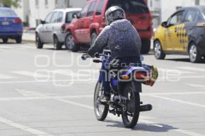 SEGURIDAD . REGULACIÓN DE MOTOCICLETAS 