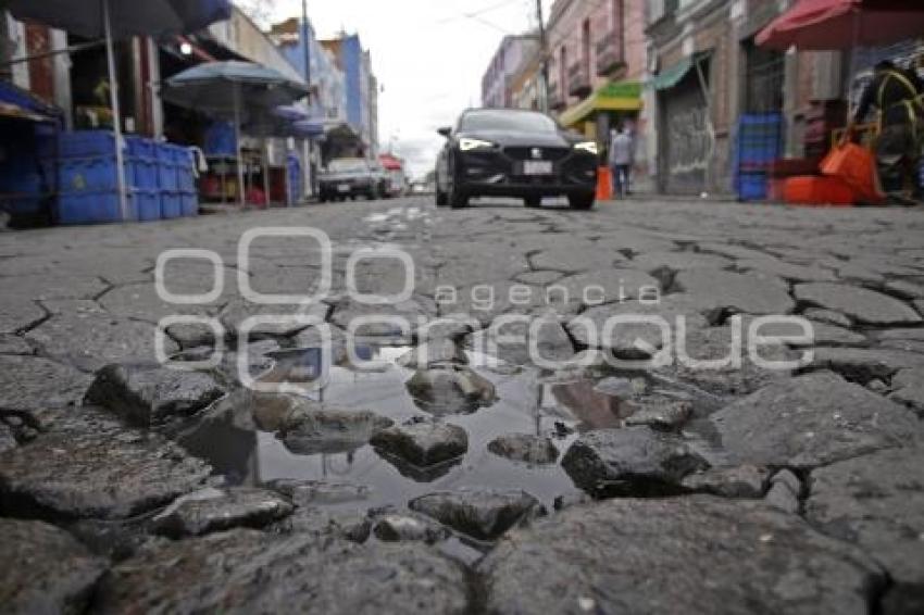 16 PONIENTE . ADOQUINES DAÑADOS