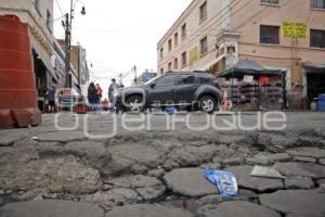 16 PONIENTE . ADOQUINES DAÑADOS