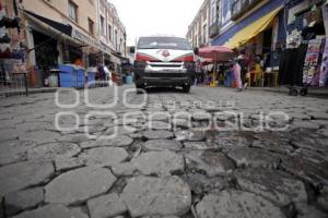 16 PONIENTE . ADOQUINES DAÑADOS