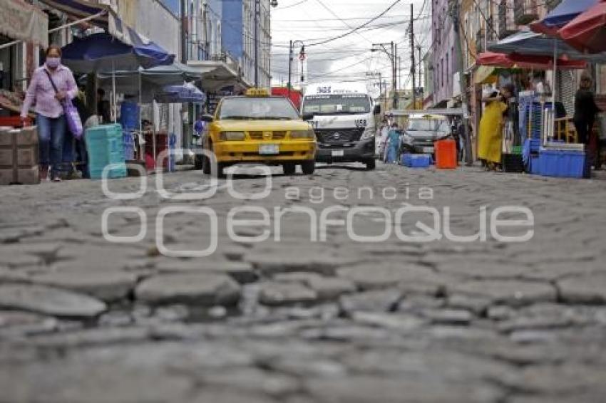 16 PONIENTE . ADOQUINES DAÑADOS