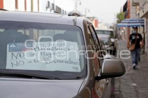 PROTESTA . PARQUÍMETROS