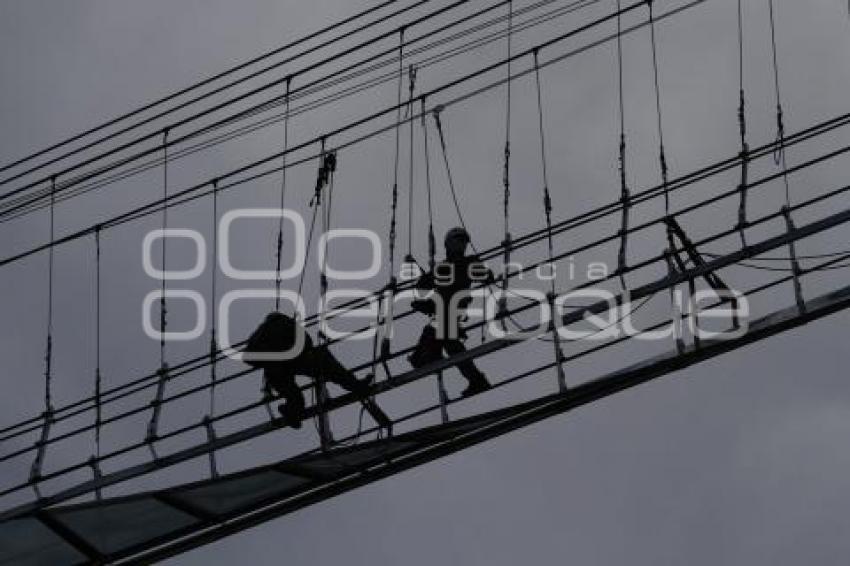 PUENTE COLGANTE . AFECTACIONES