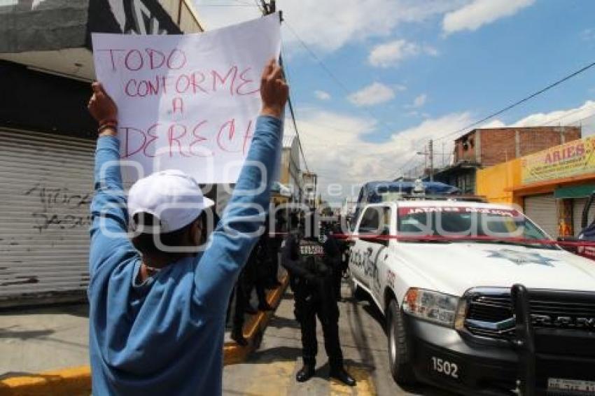 MANIFESTACIÓN . COMERCIANTES 46 PONIENTE