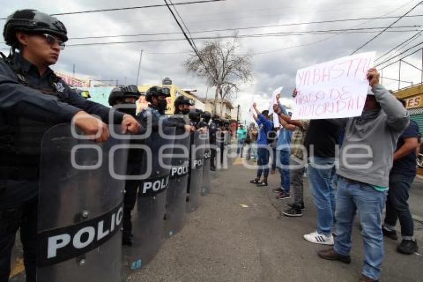 MANIFESTACIÓN . COMERCIANTES 46 PONIENTE