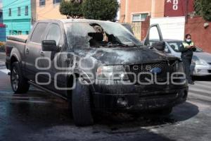 SEGURIDAD . INCENDIO CAMIONETA