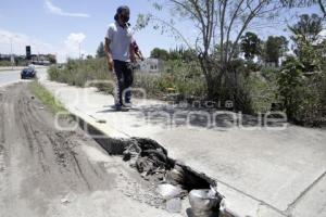 ALCANTARILLA . BASURA