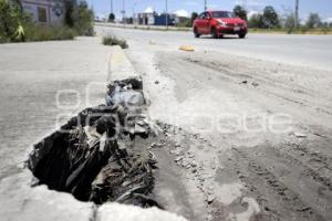 ALCANTARILLA . BASURA