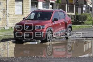 LLUVIAS . BACHES