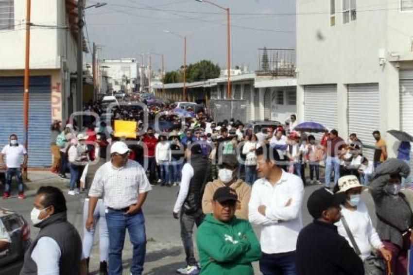 TEXMELUCAN . MANIFESTACIÓN COMERCIANTES