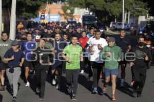 AYUNTAMIENTO . CARRERA CON CADETES