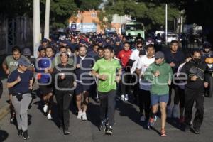 AYUNTAMIENTO . CARRERA CON CADETES