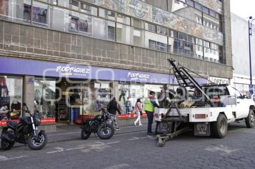 PARQUÍMETROS . RETIRO DE MOTOCICLETAS