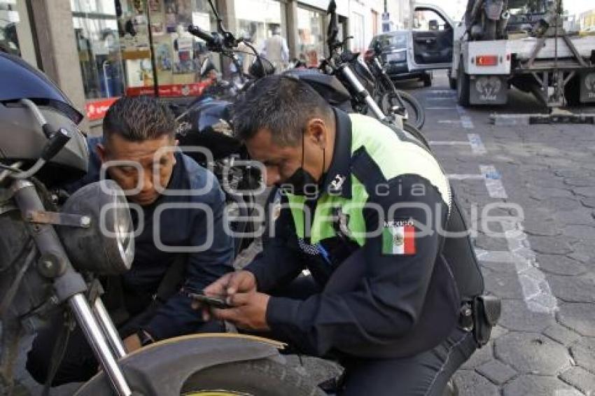 PARQUÍMETROS . RETIRO DE MOTOCICLETAS