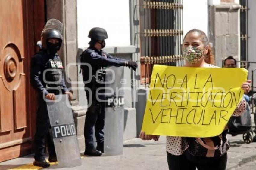 MANIFESTACIÓN . VERIFICACIÓN VEHICULAR