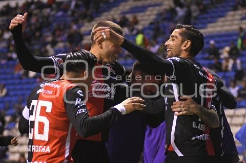 FÚTBOL . CLUB PUEBLA VS ATLAS