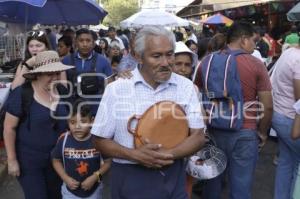 EL CALVARIO . COMERCIANTES