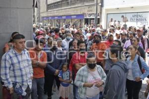 COMERCIANTES DE AMALUCAN . PROTESTA