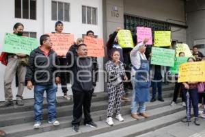 COMERCIANTES DE AMALUCAN . PROTESTA