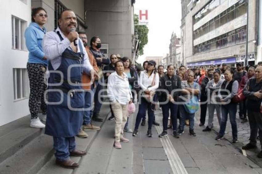 COMERCIANTES DE AMALUCAN . PROTESTA