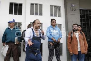 COMERCIANTES DE AMALUCAN . PROTESTA