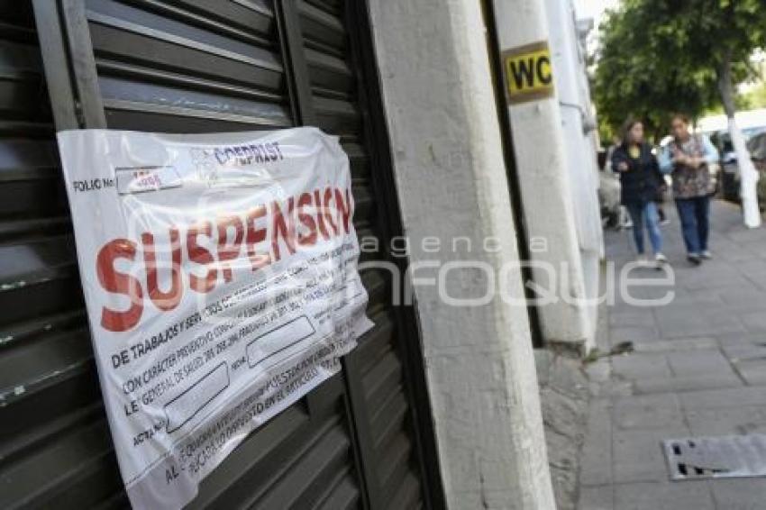 TLAXCALA . SUSPENSIÓN COMERCIO