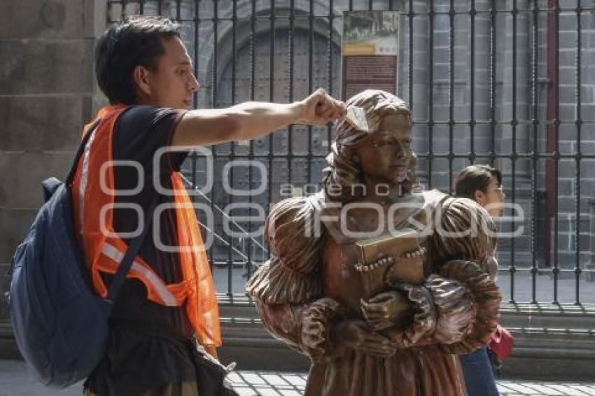 ESTATUAS CORREDOR 5 DE MAYO