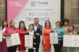 AYUNTAMIENTO . MÉRITO DOCENTE