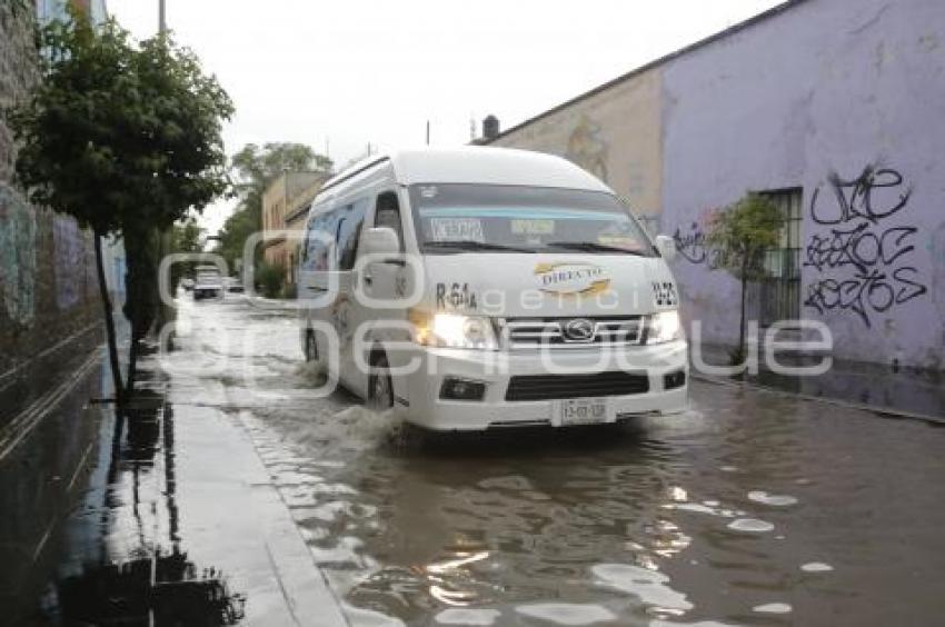 LLUVIA . INUNDACIÓN