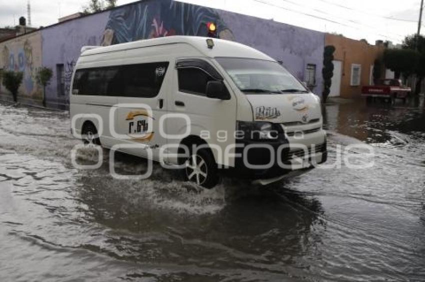 LLUVIA . INUNDACIÓN