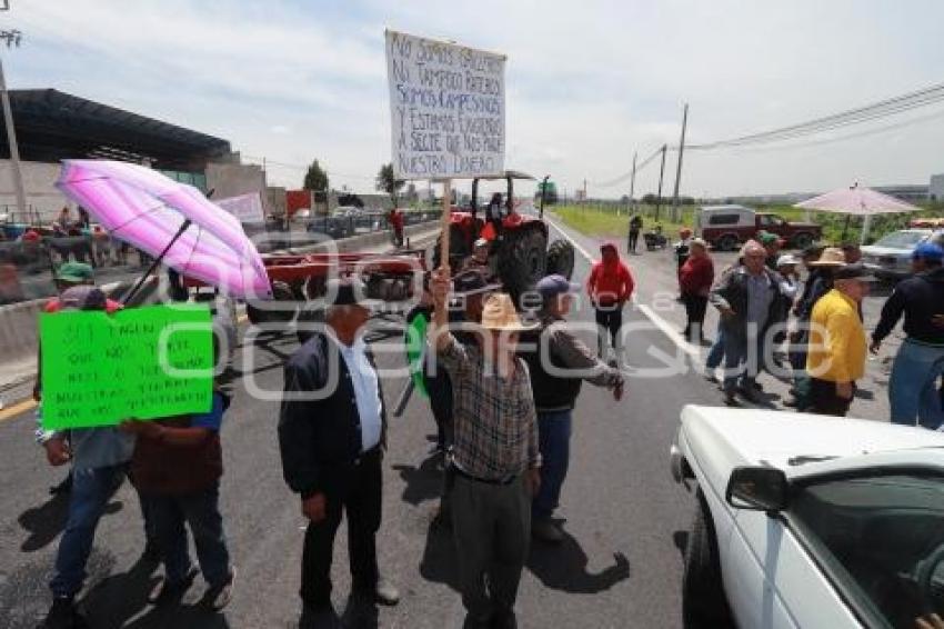 TLAXCALA . BLOQUEO POBLADORES TEXCALAC
