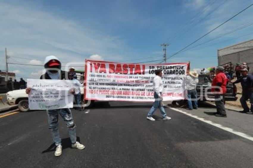TLAXCALA . BLOQUEO POBLADORES TEXCALAC