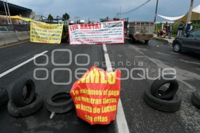 TLAXCALA . BLOQUEO POBLADORES TEXCALAC