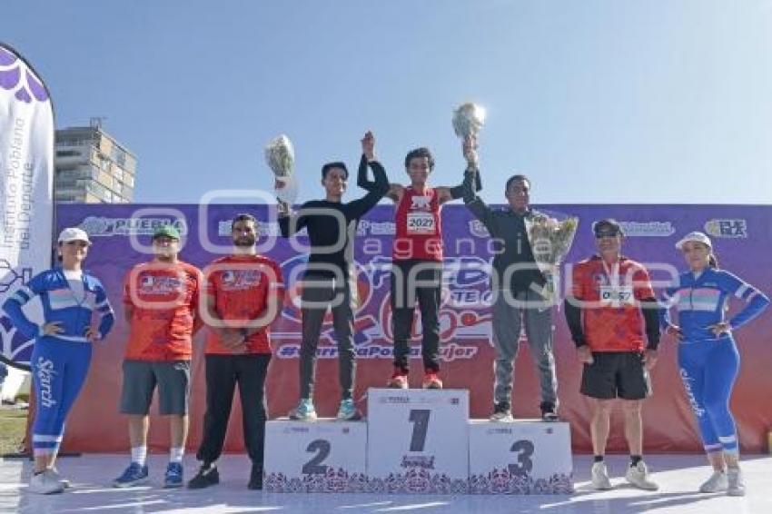 CARRERA POR LA MUJER