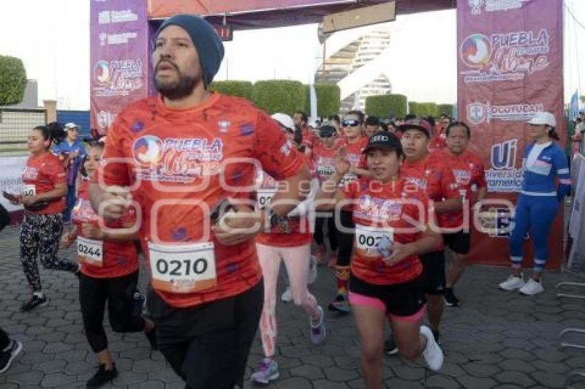 CARRERA POR LA MUJER