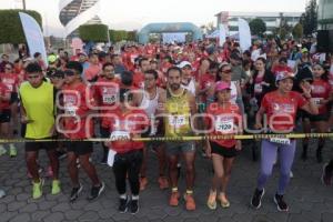 CARRERA POR LA MUJER 