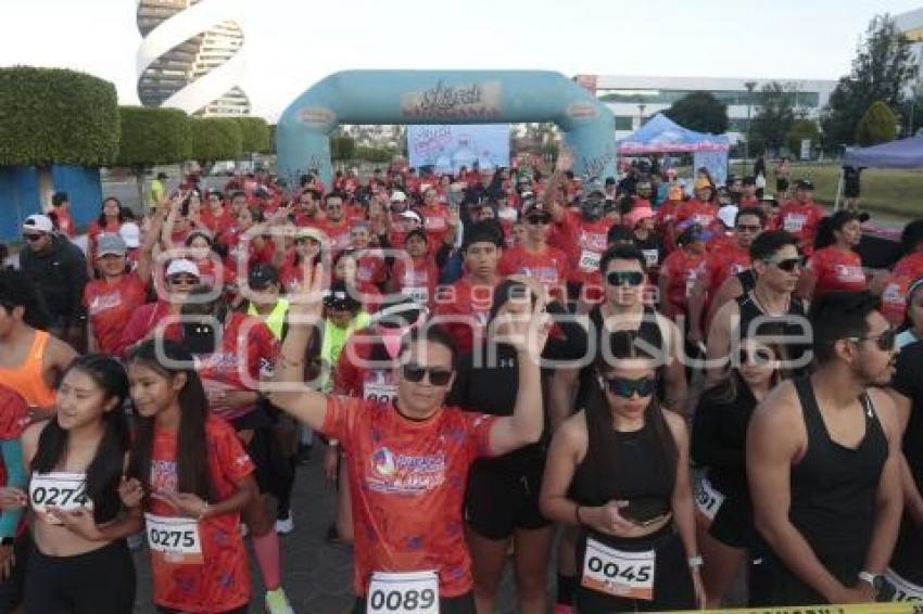 CARRERA POR LA MUJER