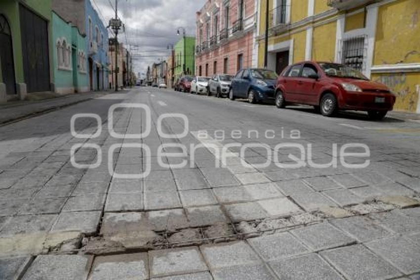 ADOQUINES MAL ESTADO